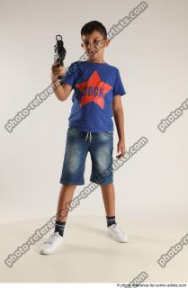 09 2020 01 TIMBO STANDING POSE WITH GUN